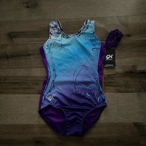 GK purple and blue, adult medium leotard with a purple scrunchie.